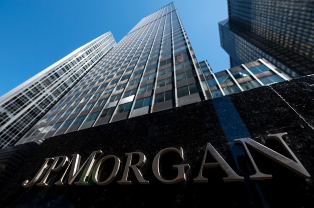 JPMorgan Chase set aside $902 million in reserves in case of bad loans, citing risk from h