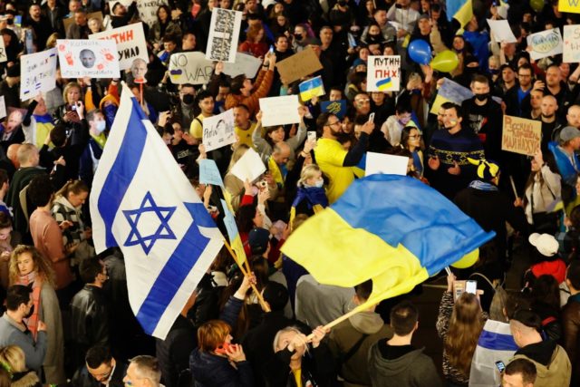 People protest against Russia's invasion of Ukraine, in front of the Russian embassy in th