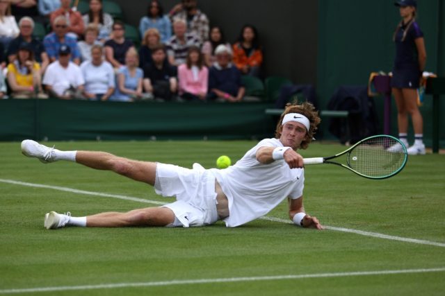 Down and out: Andrey Rublev in action at last year's Wimbledon