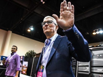Apple CEO Tim Cook arrives at the Berkshire Hathaway shareholders meeting in Omaha, Nebraska on April 30, 2022; he was one of thousands of shareholders gathering to hear from investment guru Warren Buffett