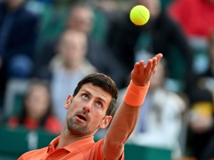 OPSHOT - Serbia's Novak Djokovic serves the ball to Serbia's Laslo Djere during their tennis single match at Serbia Tennis Open ATP 250 series tournament in Belgrade on April 20, 2022. (Photo by ANDREJ ISAKOVIC / AFP) (Photo by ANDREJ ISAKOVIC/AFP via Getty Images)