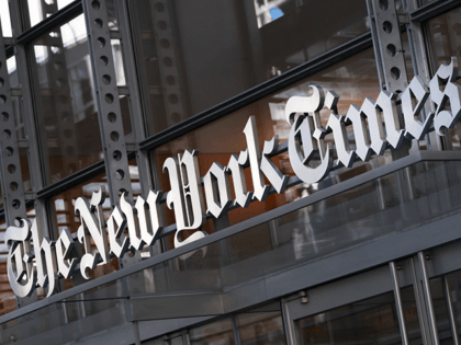 A sign for The New York Times hangs above the entrance to its building, Thursday, May 6, 2021 in New York. The New York Times has named Joseph Kahn as its new executive editor, replacing Dean Baquet as leader of the storied paper's newsroom. The Times said Kahn, who has …