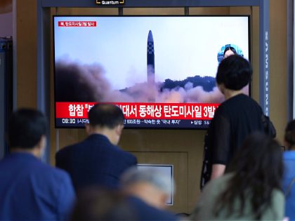 People watch a TV screen showing a news program reporting about North Korea's missile launch with file footage, at a train station in Seoul, South Korea, Wednesday, May 25, 2022. North Korea launched three ballistic missiles toward the sea on Wednesday, its neighbors said, hours after President Joe Biden wrapped …