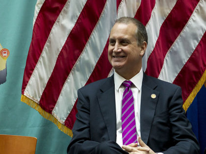 Rep. Mario Diaz-Balart, R-Fla., listens during a infrastructure investment announcement at transportation headquarters in Washington, Tuesday, Dec. 11, 2018. (AP Photo/Jose Luis Magana)