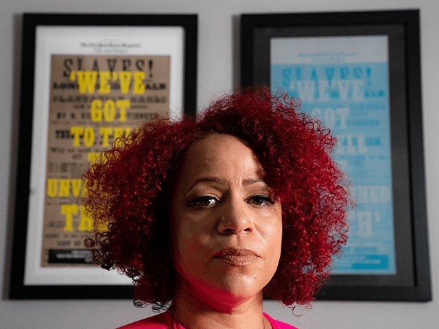 Nikole Hannah-Jones stands for a portrait at her home in the Brooklyn borough of New York,