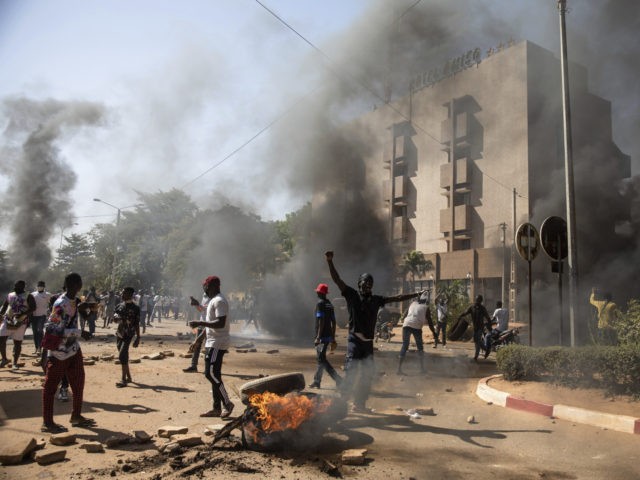 Protestors take to the streets of Burkina Faso's capital Ouagadougou Saturday Nov. 27