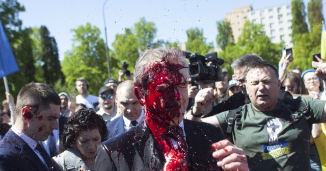 Russian Ambassador Hit With Red Paint During War Memorial Visit