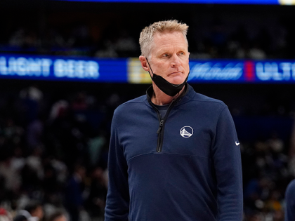 Golden State Warriors head coach Steve Kerr walks off the court after the first half of Game 4 of the NBA basketball playoffs Western Conference finals against the Dallas Mavericks, Tuesday, May 24, 2022, in Dallas. (AP Photo/Tony Gutierrez)