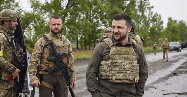 Russian Forces Storm City as Zelensky Visits Front