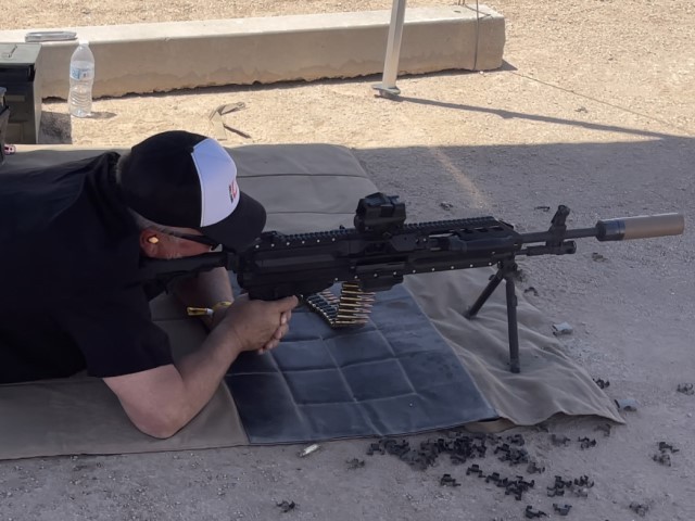 AWR Hawkins shoots a SIG-LMG at the Ben Avery Shooting Range in Phoenix, Arizona, during the first SIG Freedom Days event, held May 6-8, 2022. (AWR Hawkins) 