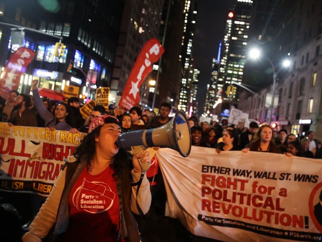 Hundreds of anti-Donald Trump protestors march through the street on 6th Avenue on their way to Trump Tower, November 9, 2016 in New York City. Republican candidate Donald Trump won the 2016 presidential election in the early hours of the morning in a widely unforeseen upset. (Drew Angerer/Getty)
