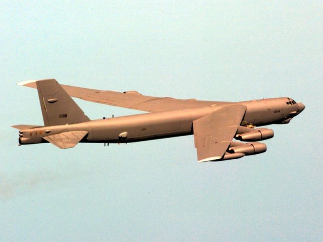A B-52H Stratofortress of the 2nd Air Expeditionary Group, Royal Air Force Fairford, England, heads toward a target in Kosovo during a NATO Operation Allied Force Combat Penetration mission. The aircraft carries a large amount of iron bombs, some of which are visable hanging under the starboard wind. The 2nd …