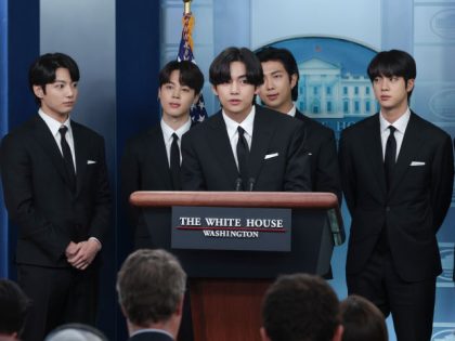 WASHINGTON, DC - MAY 31: Members of the South Korean pop group BTS speak at the daily press briefing at the White House on May 31, 2022 in Washington, DC. BTS met with U.S. President Joe Biden to discuss Asian inclusion and representation, and to discuss the recent rise in …