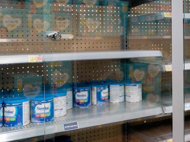 Grocery store shelves where baby formula is typically stocked are locked and nearly empty in Washington, DC, on May 11, 2022. - It's a parent's worst nightmare. The United States is in the grip of a severe shortage of baby formula -- with a mass product recall aggravating pandemic supply chain woes -- sending families on sometimes desperate hunts for the vital supplies. And it's been going on for months, according to Sara Khan, the mother of three children ages 10 years, seven years and six months. (Photo by Stefani Reynolds / AFP) (Photo by STEFANI REYNOLDS/AFP via Getty Images)