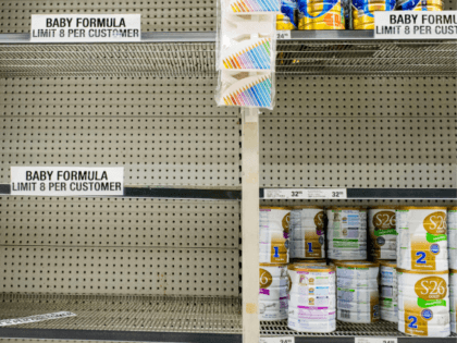 SYDNEY, AUSTRALIA - NOVEMBER 12: Shelves almost empty of baby formula with signs warning c