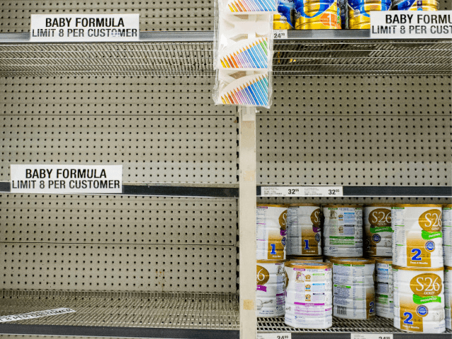SYDNEY, AUSTRALIA - NOVEMBER 12: Shelves almost empty of baby formula with signs warning customers that they are limited to 8 cans per customers at a large Sydney supermarket on November 12, 2015 in Sydney, Australia. The Federal Government has started talks with major retailers to try and address the …