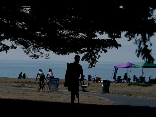 People visit Robert W. Crown Memorial State Beach during the coronavirus outbreak in Alame