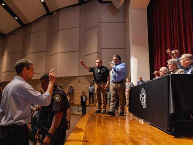 Democratic gubernatorial candidate Beto O'Rourke interrupts a press conference held by Texas Gov. Greg Abbott on May 25, 2022, following a shooting the day before at Robb Elementary School in Uvalde, Texas. (Jordan Vonderhaar/Getty Images)