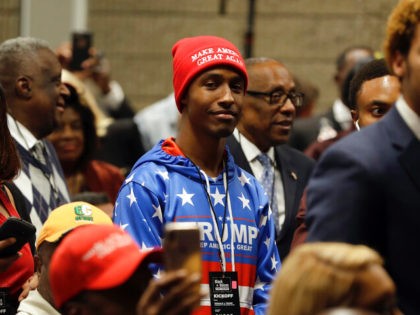 Supporters of President Donald Trump wait to listen to him speak during the launch of "Black Voices for Trump," at the Georgia World Congress Center, Friday, Nov. 8, 2019, in Atlanta. (AP Photo/ Evan Vucci)