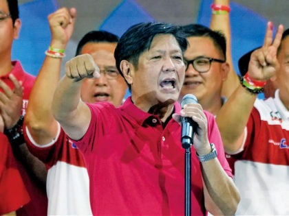Presidential hopeful, former senator Ferdinand "Bongbong" Marcos Jr., the son of the late dictator, gestures as he greets the crowd during a campaign rally in Quezon City, Philippines on Wednesday, April 13, 2022. Campaigning in the Philippines' presidential election continues with a cast of candidates led by a late dictator's …
