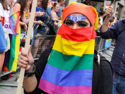 LONDON, ENGLAND - JULY 06: A parade goer wears a rainbow Niqab during Pride in London 2019 on July 06, 2019 in London, England. (Photo by Tristan Fewings/Getty Images for Pride in London)