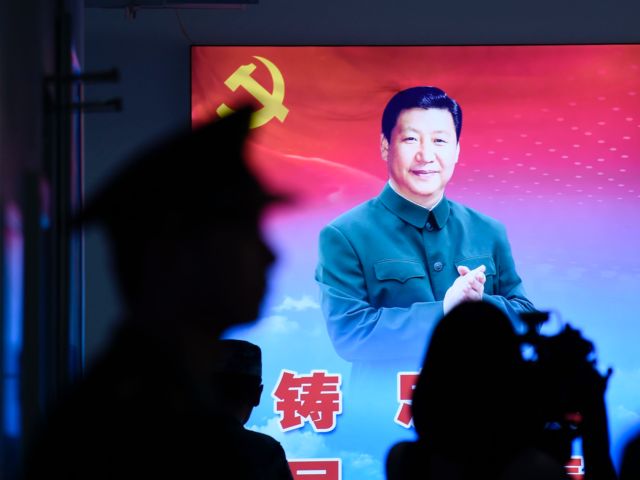 A portrait of China's President Xi Jinping is seen during a tour arranged for the media by