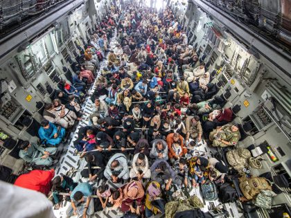 KABUL, AFGHANISTAN - AUGUST 21: In this handout image provided by the Ministry of Defence, a full flight of 265 people are evacuated out of Kabul by the UK Armed Forces on August 21, 2021 in Kabul, Afghanistan. The British armed forces are evacuating UK citizens and eligible personnel out …