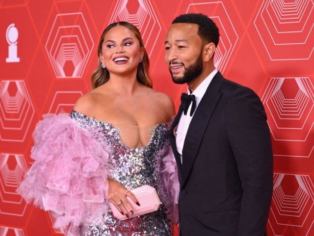 US singer-songwriter John Legend and his wife model Chrissy Teigen attend the 74th Annual