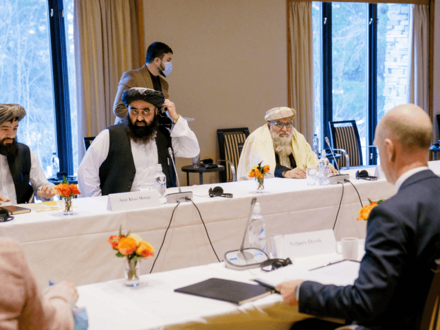 Taliban representatives (L-R) Abdul Hakim Sharaie, Amir Khan Muttaqi, Mutiul Haq Nabi Kheel and Sharafuddin Muslim attend a meeting with Norwegian officials and representatives from the Taliban at the Soria Moria hotel in Oslo, Norway, on January 25, 2022, the last day of the hardline Islamists' controversial first visit to …