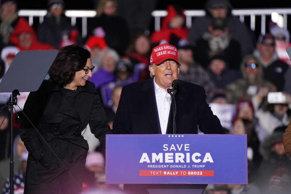 FLORENCE, SC - MARCH 12: Former US President Donald Trump, right, is joined on stage by Republican House of Representatives candidate Katie Arrington to the crowd during a rally at the Florence Regional Airport on March 12, 2022 in Florence, South Carolina. Todays visit by Trump is his first rally in South Carolina since his election loss in 2020. (Photo by Sean Rayford/Getty Images)