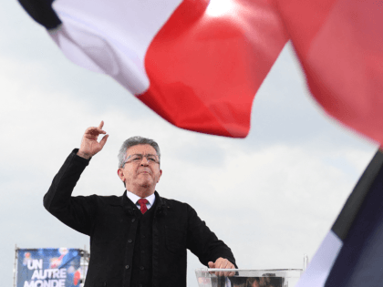 "La France Insoumise" (LFI) party presidential candidate Jean-Luc Melenchon gestures as he delivers a speech during his meeting in Marseille, southern France on March 27, 2022, as part of the presidential campaign. - The first round of the French presidential election is to take place on April 10, 2022, the …