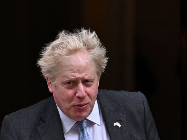 Britain's Prime Minister Boris Johnson exits 10 Downing Street, in London, on April 28, 20