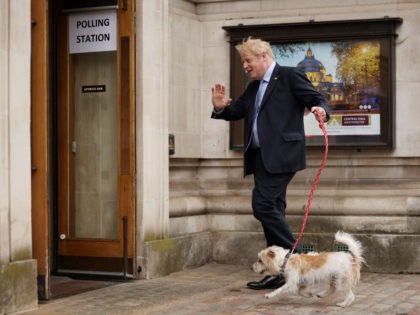 LONDON, ENGLAND - MAY 05: British Prime Minister and Conservative Party Leader Boris Johnson arrives to cast his vote at a polling station on May 5, 2022 in London, United Kingdom. Voters go to the polls in the local elections today to decide seats on 146 unitary, metropolitan, district and …