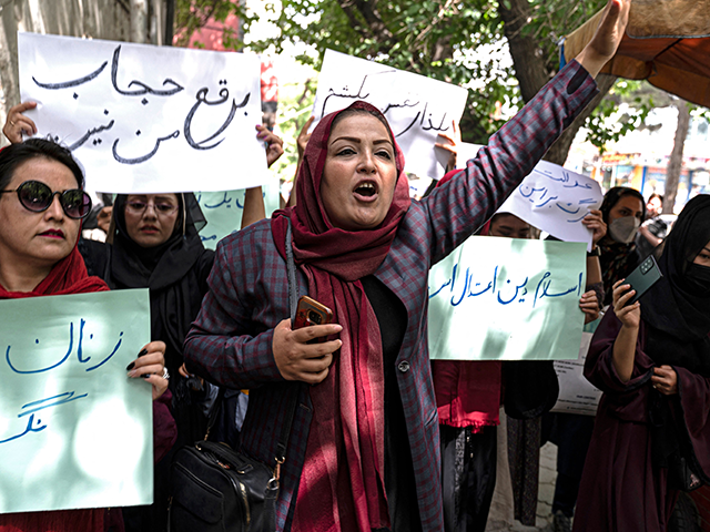 Biden - Members of Afghanistan's Powerful Women Movement, take part in a protest in Kabul