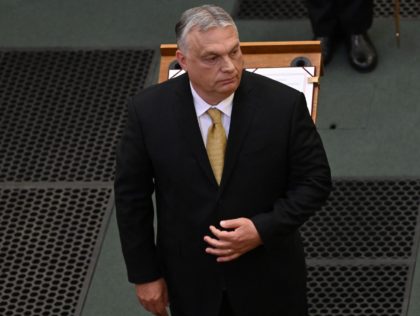 Hungarian Prime Minister Viktor Orban looks on as he prepares to take the oath during the investiture ceremony at the Parliament in Budapest, Hungary, on May 16, 2022. - Hungarian Prime Minister Viktor Orban's Fidesz party had won a fourth straight term at the parliamentary elections on Sunday, April 3, …