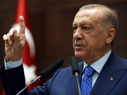 Turkey's President and leader of the Justice and Development (AK) Party Recep Tayyip Erdogan gestures as he delivers a speech during his partys group meeting at the Turkish Grand National Assembly (TGNA) in Ankara, on May 18, 2022. - Recep Tayyip Erdogan, who has threatened to block Finland and Sweden …