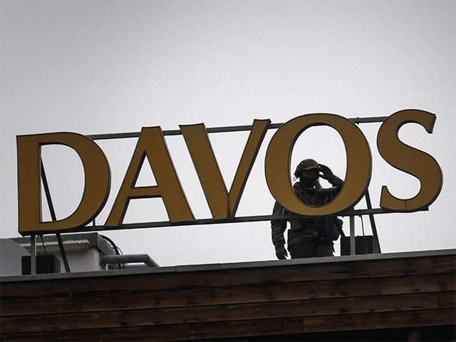 A speciale police officer is seen on the roof of the Congress hotel during a session at th