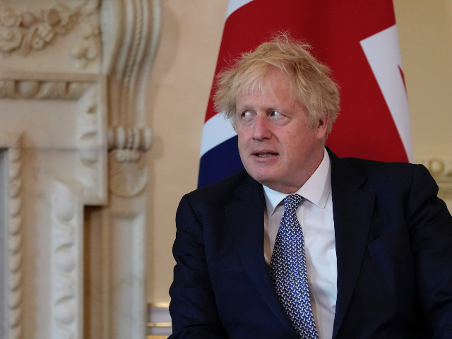 LONDON, ENGLAND - MAY 24: British Prime Minister Boris Johnson listens during the meeting with the Amir of Qatar Sheikh Tamim bin Hamad Al Thani inside 10 Downing Street on May 24, 2022 in London, England. (Photo by Matt - Dunham - WPA Pool/Getty Images)