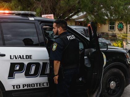 UVALDE, TX - MAY 24: Uvalde Police gather outside the home of suspected gunman 18-year-old