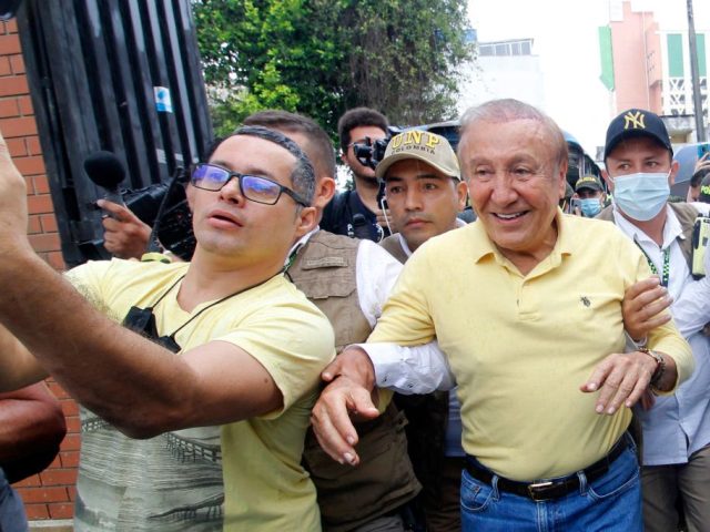 A fan takes a selfie picture with Colombian independent presidential candidate Rodolfo Her