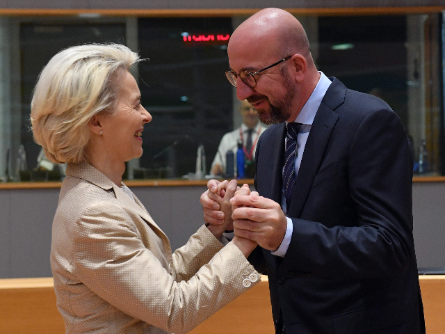 President of the European Commission Ursula von der Leyen (L) is greeted by President of the European Council Charles Michel ahead of EU leaders extraordinary meeting to discuss Ukraine, defence and energy in Brussels, on May 31, 2022. (Photo by JOHN THYS / AFP) (Photo by JOHN THYS/AFP via Getty …