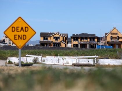 PETALUMA, CALIFORNIA - MARCH 23: Homes under construction are seen at a housing development on March 23, 2022 in Petaluma, California. According to a report by the Commerce Department, sales of new single-family homes slowed in February as mortgage rates inch up and and house prices continue to rise. (Photo …