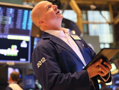 NEW YORK, NEW YORK - MAY 05: Traders work the floor of the New York Stock Exchange during morning trading on May 05, 2022 in New York City. Stocks opened lower this morning after closing high on Wednesday after the Federal Reserve announced an interest-rate hike by half a percentage …