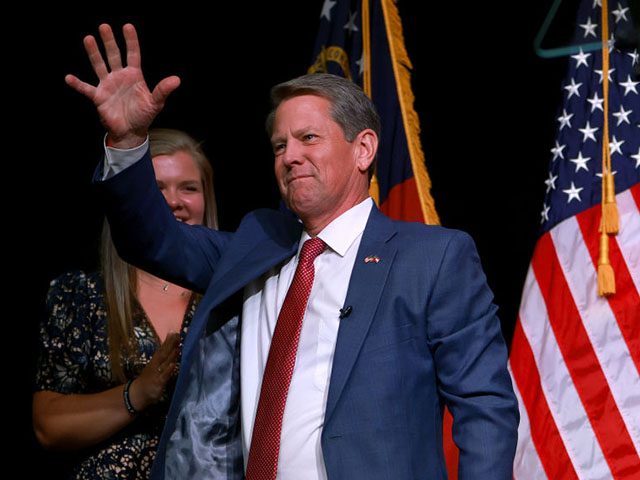 ATLANTA, GEORGIA - MAY 24: Republican gubernatorial candidate Gov. Brian Kemp waves during his primary night election party at the Chick-fil-A College Football Hall of Fame on May 24, 2022 in Atlanta, Georgia. Kemp defeated former U.S. Sen. David Perdue (R-GA) in the primary as he bids for a second …