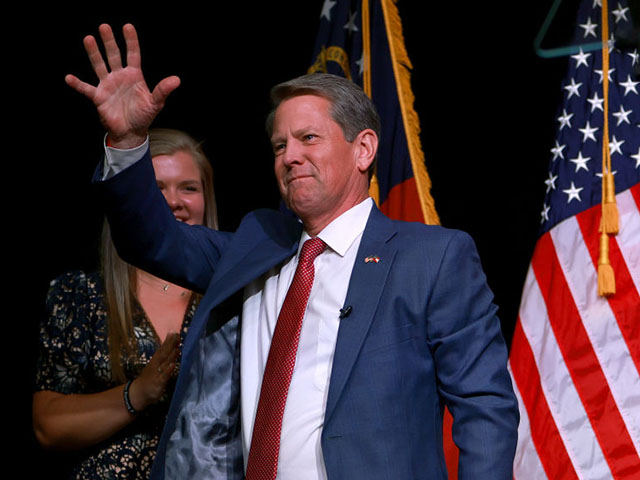 ATLANTA, GEORGIA - MAY 24: Republican gubernatorial candidate Gov. Brian Kemp waves during his primary night election party at the Chick-fil-A College Football Hall of Fame on May 24, 2022 in Atlanta, Georgia. Kemp defeated former U.S. Sen. David Perdue (R-GA) in the primary as he bids for a second term as Georgia governor. (Photo by Joe Raedle/Getty Images)