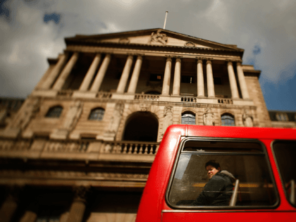 LONDON - APRIL 16: (EDITORS NOTE: THIS IMAGE WAS CREATED USING A VARIABLE PLANED LENS) A passenger on a bus passes The Bank of England on April 16, 2008 in London, England. The United Kingdom's financial outlook still looks gloomy, with house prices continuing to fall even after interest rates …