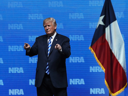 DALLAS, TX - MAY 04: U.S. President Donald Trump greets supporters at the NRA-ILA Leadership Forum during the NRA Annual Meeting & Exhibits at the Kay Bailey Hutchison Convention Center on May 4, 2018 in Dallas, Texas. The National Rifle Association's annual meeting and exhibit runs through Sunday. (Photo by …