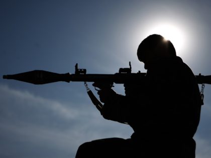 An Afghan soldier poses with his rocket propelled grenade (RPG) launcher at an "Eagle's Nest" observation post in the Alah Say valley in Kapisa province on January 4, 2010. France warned it could take time to free two kidnapped French journalists and three Afghan assistants, as their employer sent a …