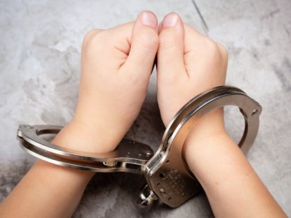 Handcuffed child