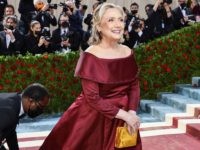 Hillary Clinton Maskless at Met as Masked Black Staffer Attends Gown